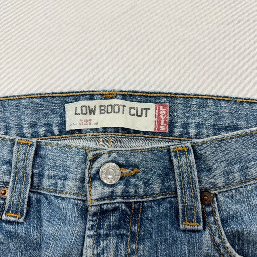Levi's Jeans 527 Low Boot Cut Light Wash Denim Blue Mens W32 L34